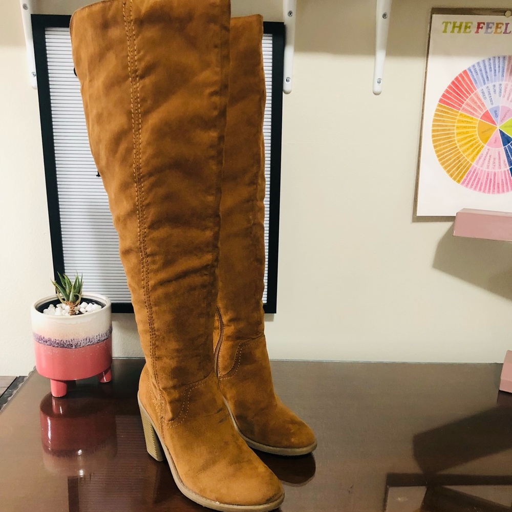 Above knee brown boots